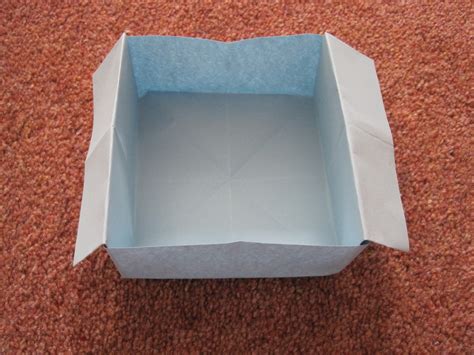 folding a metal box|fold paper into box.